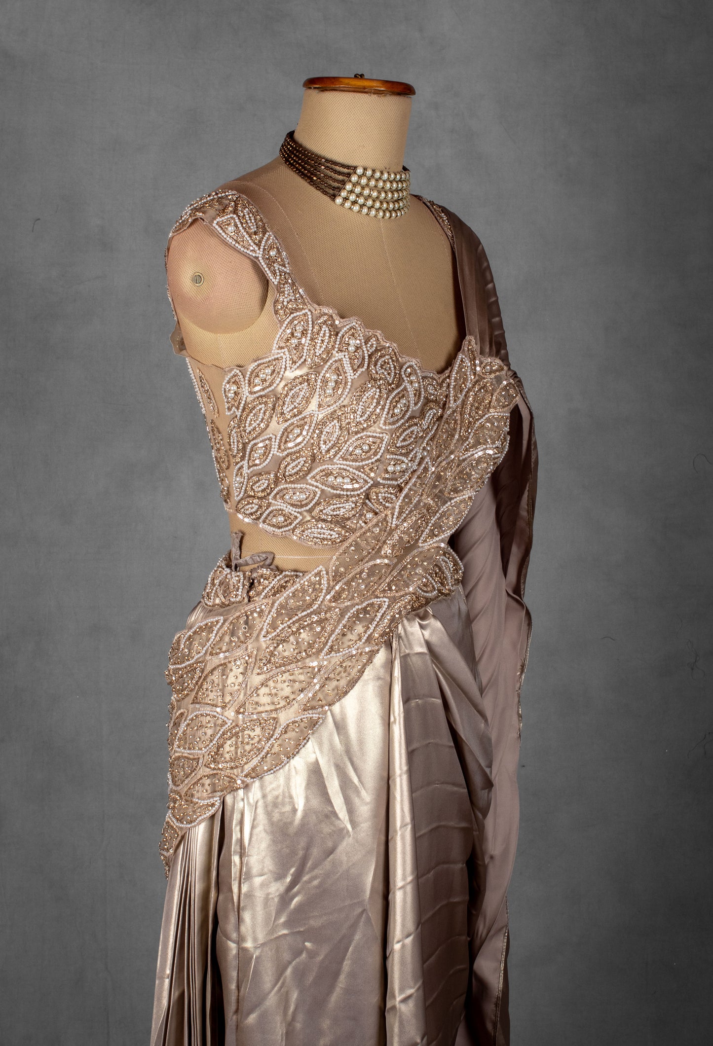 Champagne Satin Drape Saree with Intricately Embellished Blouse