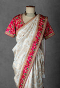 Ivory and Red Banarasi Silk Saree with Hand-Embroidered Blouse