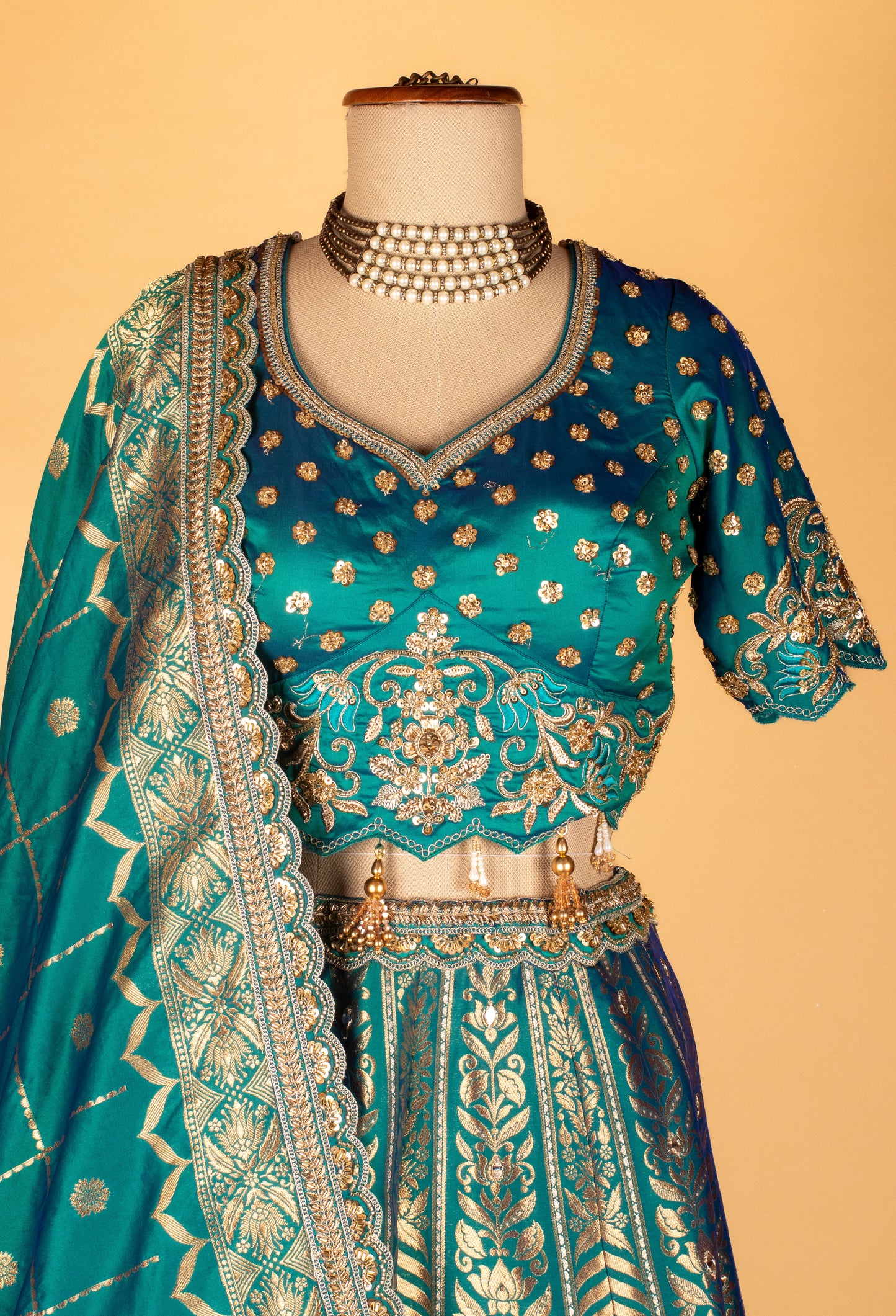 Teal Banarasi Brocade Lehenga with Embellished Crop Top & Woven Silk Dupatta