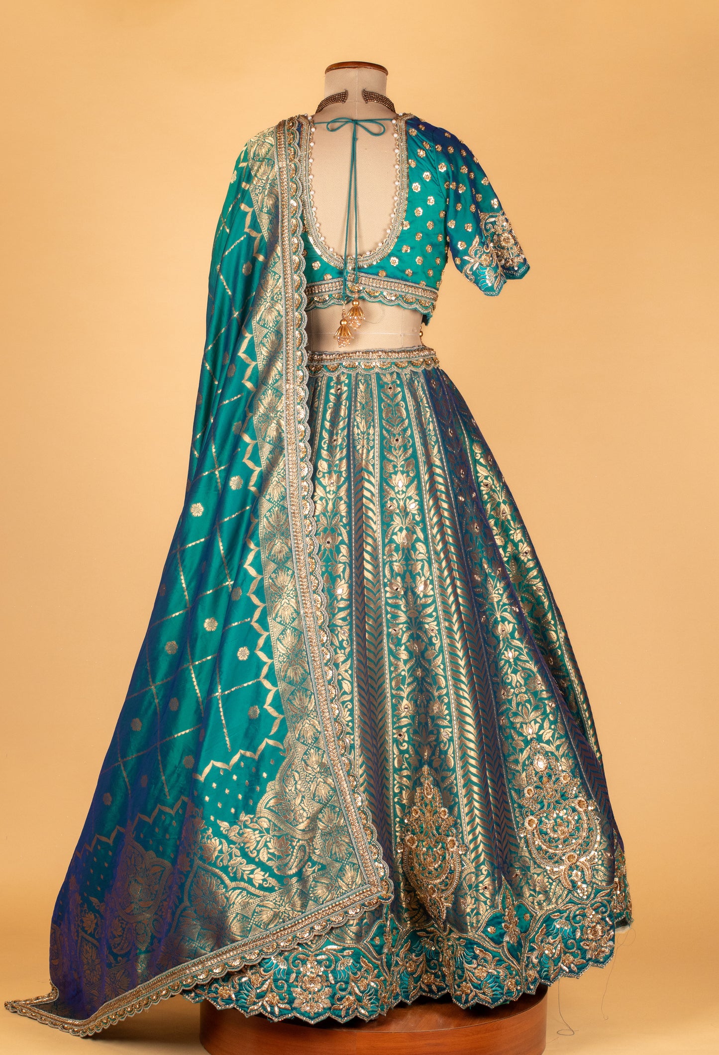 Teal Banarasi Brocade Lehenga with Embellished Crop Top & Woven Silk Dupatta