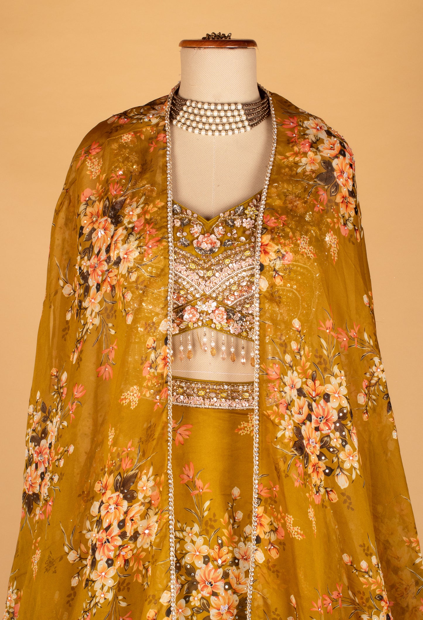 Mustard Floral Printed Lehenga with Embellished Crop Top & Cape-Style Dupatta