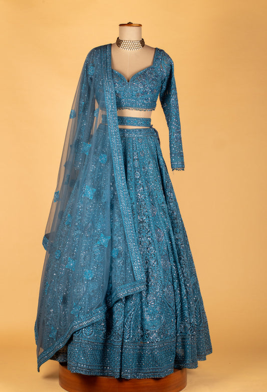 Teal hand-embroidered lehenga with long-sleeve crop top and net dupatta – product image 2