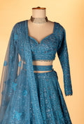 Teal Intricately Hand-Embroidered Lehenga with Long-Sleeve Crop Top & Textured Net Dupatta