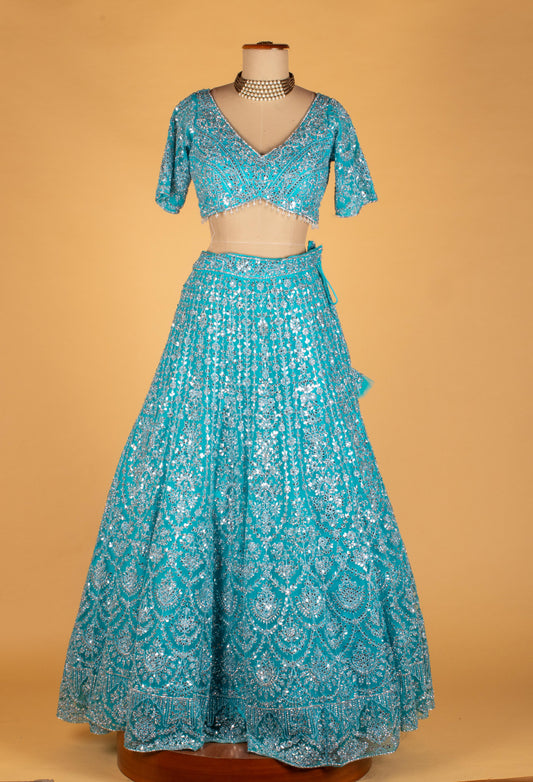 Aqua blue sequin embroidered lehenga set with crop top and net dupatta – product image 2