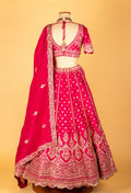 Rani Pink Hand-Embroidered Lehenga with Scalloped Crop Top & Ornate Dupatta