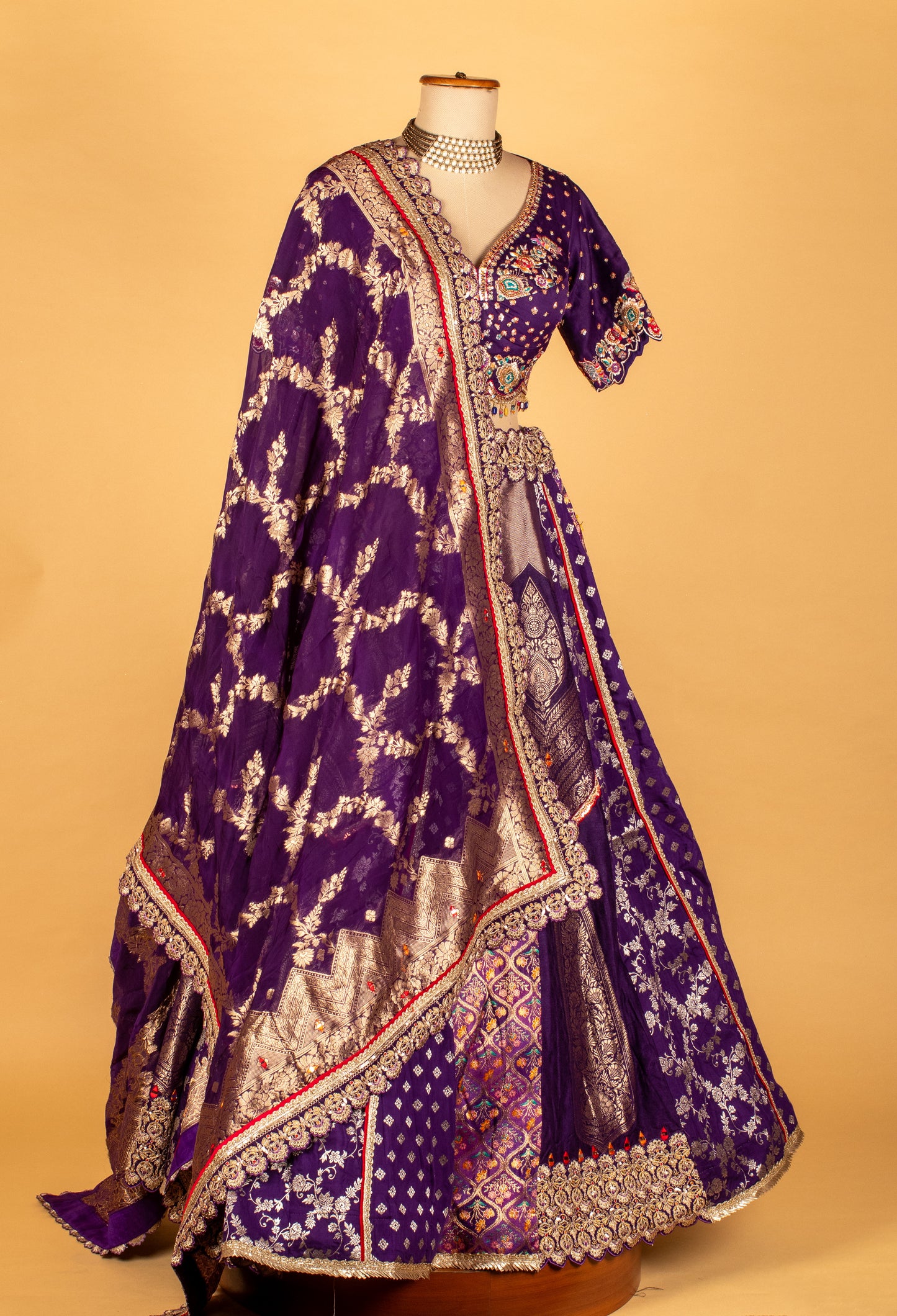 Royal Purple Banarasi Zari Croptop Lehenga with Multicolor Hand Embroidery