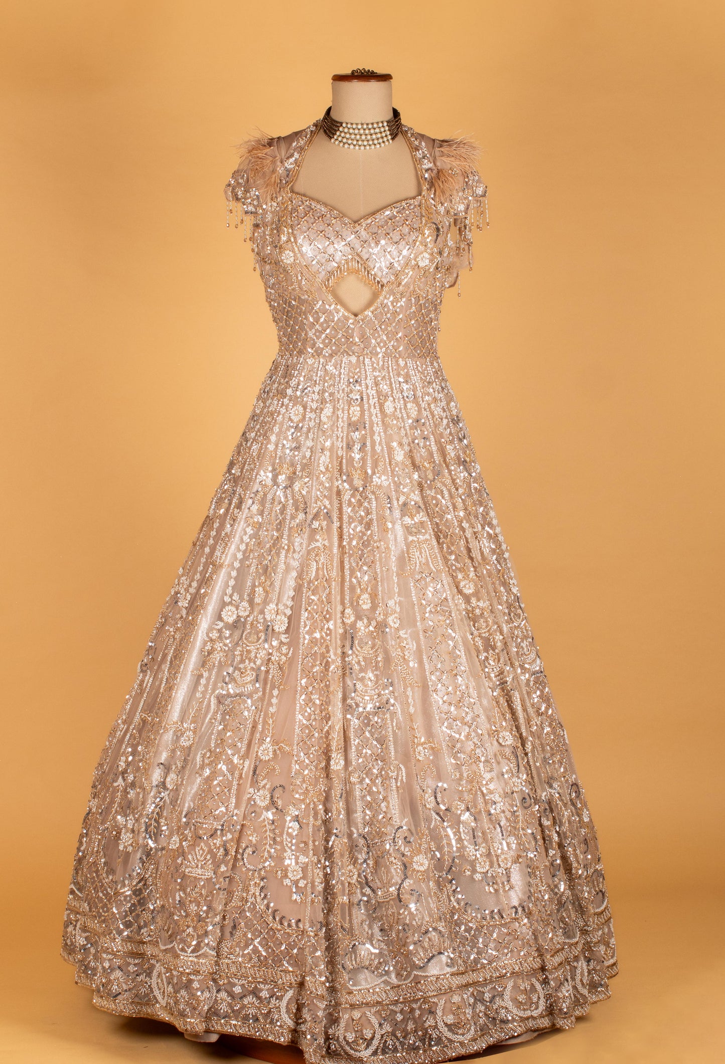 Champagne Gold Fully Hand-Embroidered Bridal Gown with Feathered Shoulders & Cut-Out Bodice