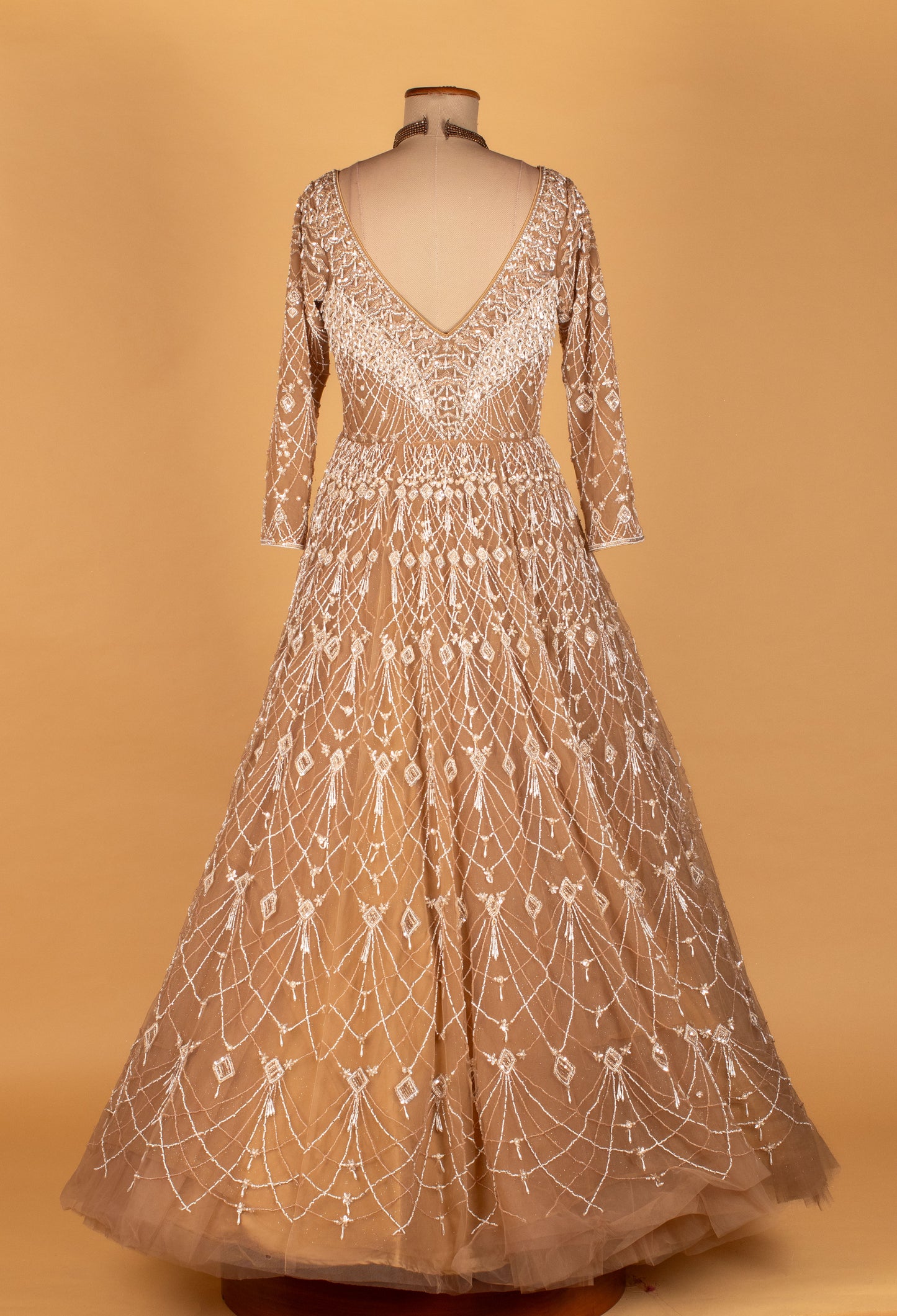 Champagne Gold Net Gown with Intricate Geometric Sequin Embellishment