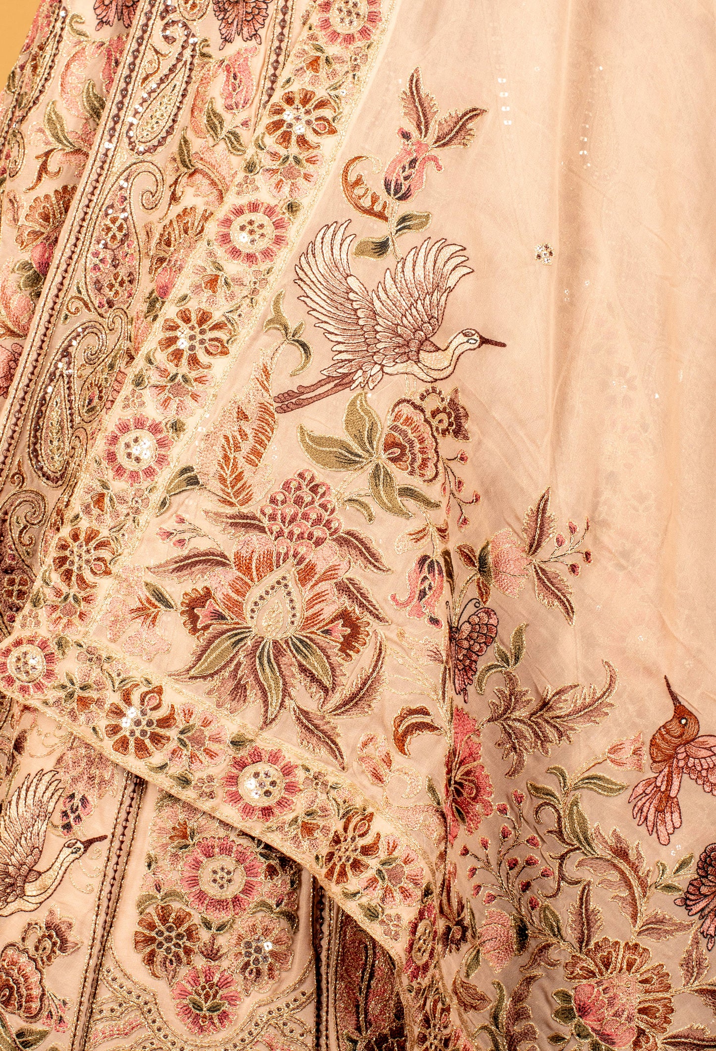 Blush Pink Hand-Embroidered Lehenga with Multicolor Floral & Bird Motifs