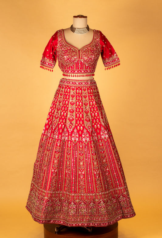 Ruby red heavy embroidered lehenga with crop top and designer dupatta – product image 2