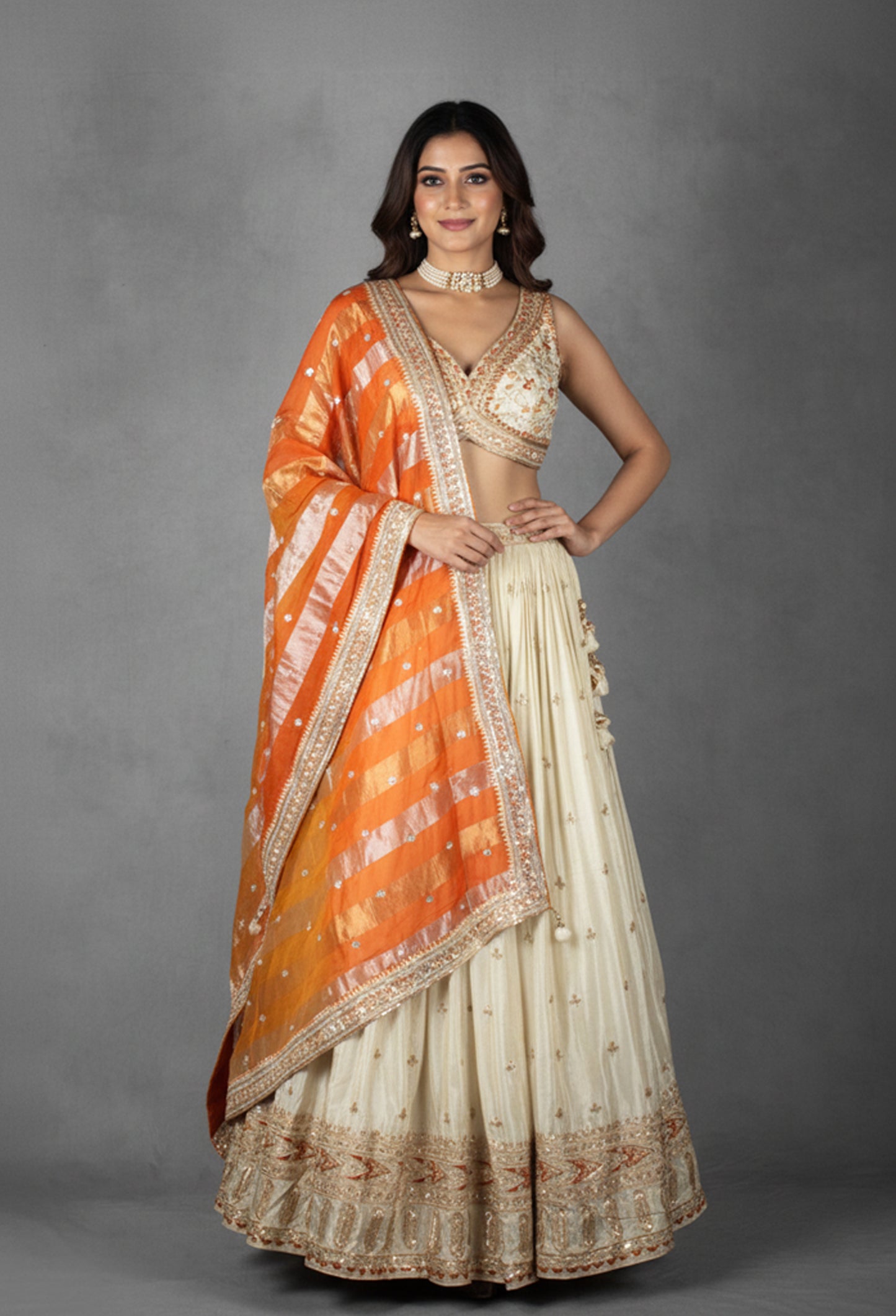 Cream Embroidered Lehenga Set with Heavy Designer Crop Top & Contrast Orange Dupatta