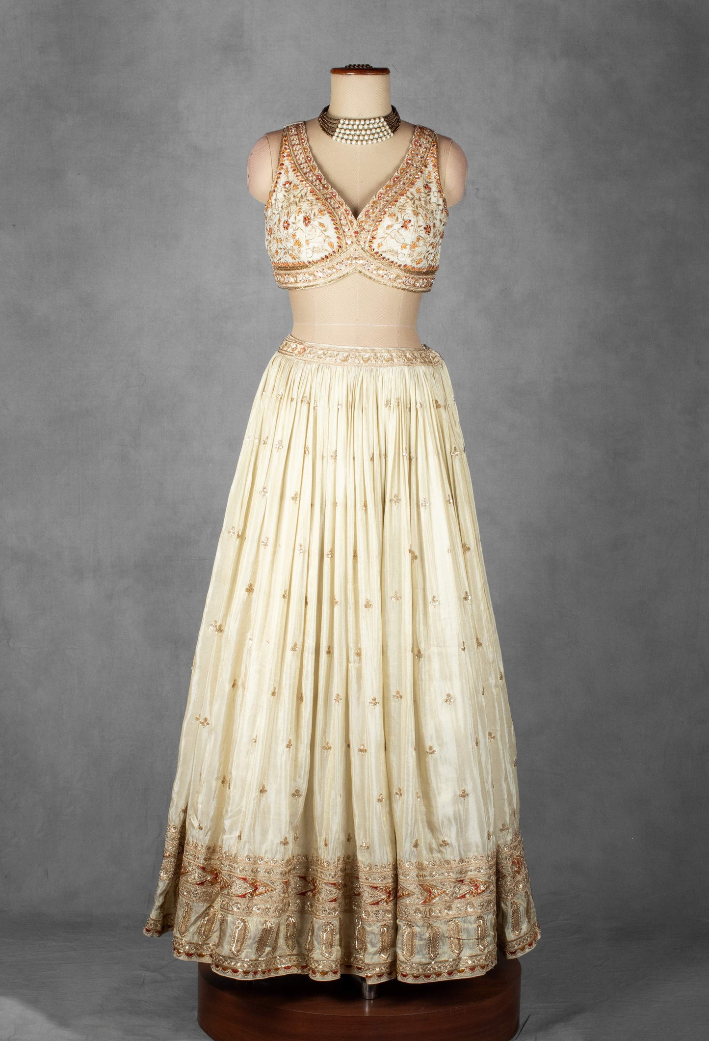 Cream Embroidered Lehenga Set with Heavy Designer Crop Top & Contrast Orange Dupatta