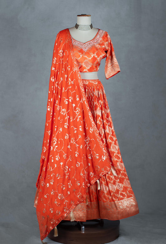 Vibrant orange zari embroidered lehenga set with matching dupatta – product image 2