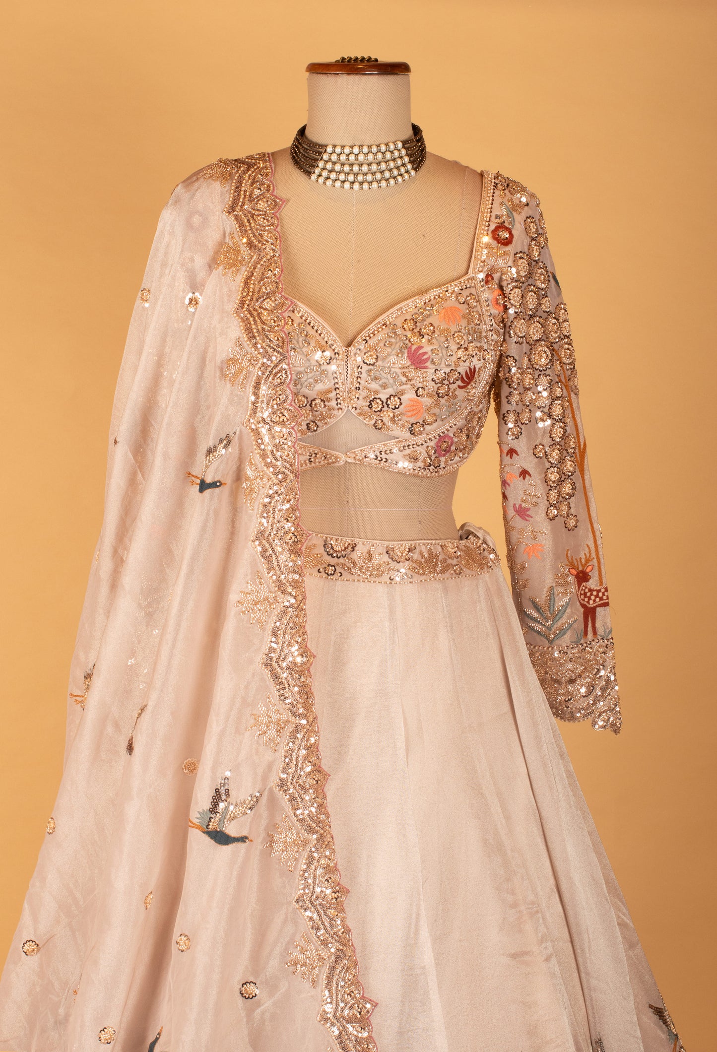 Pastel Peach Embroidered Lehenga with 3D Floral Work & Bird Motifs – Designer Bridal & Festive Wear