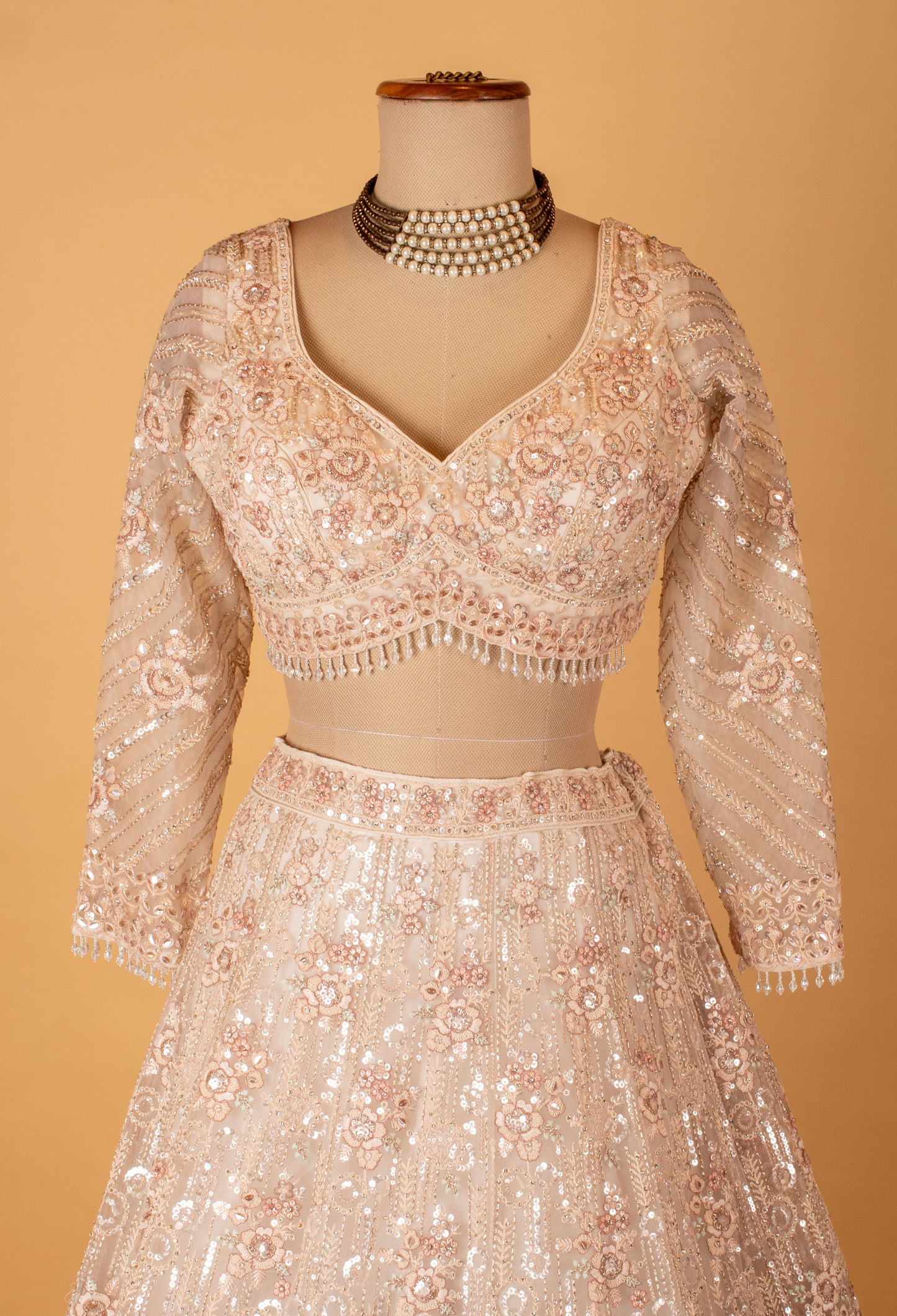 Champagne Ivory Embellished Crop Top Lehenga Set with Net Dupatta