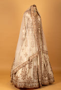 Ivory Embroidered Anarkali Lehenga Set with Gold Work & Net Dupatta