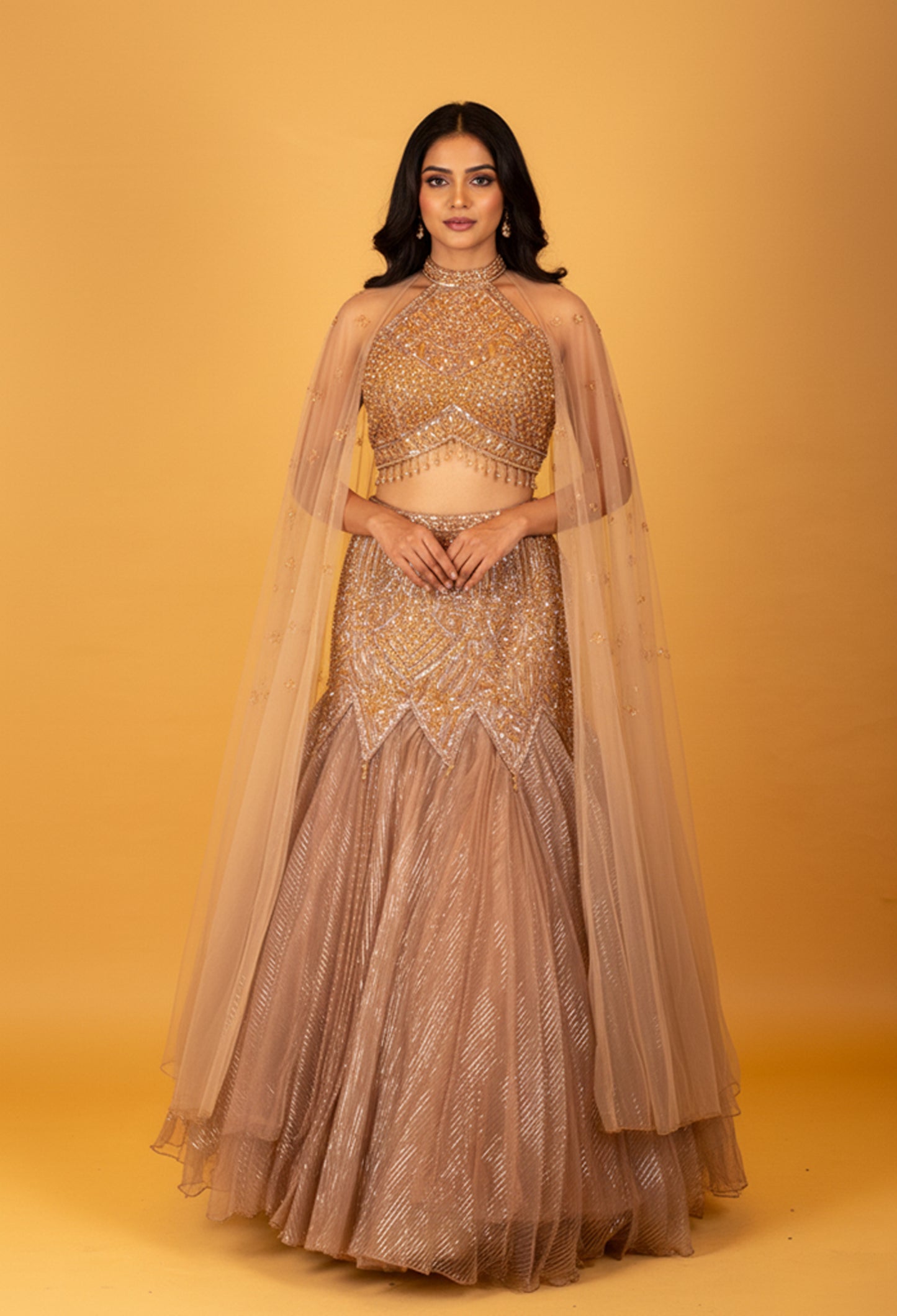 Champagne Gold Embellished Crop Top Lehenga Set with Sheer Cape