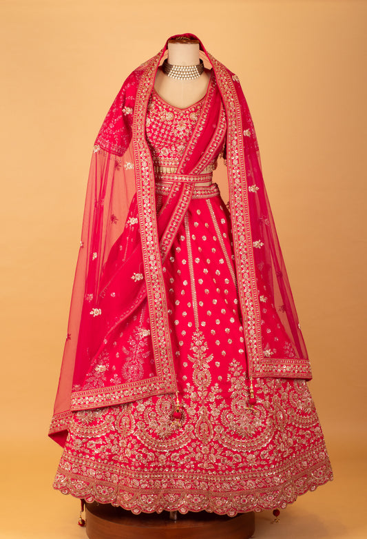 Red bridal embroidered lehenga with heavy work and net dupatta – product image 2