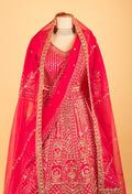 Women’s Rani Pink Heavy Zardozi Embroidered Bridal Lehenga Choli with Dupatta | Luxury Wedding Couture