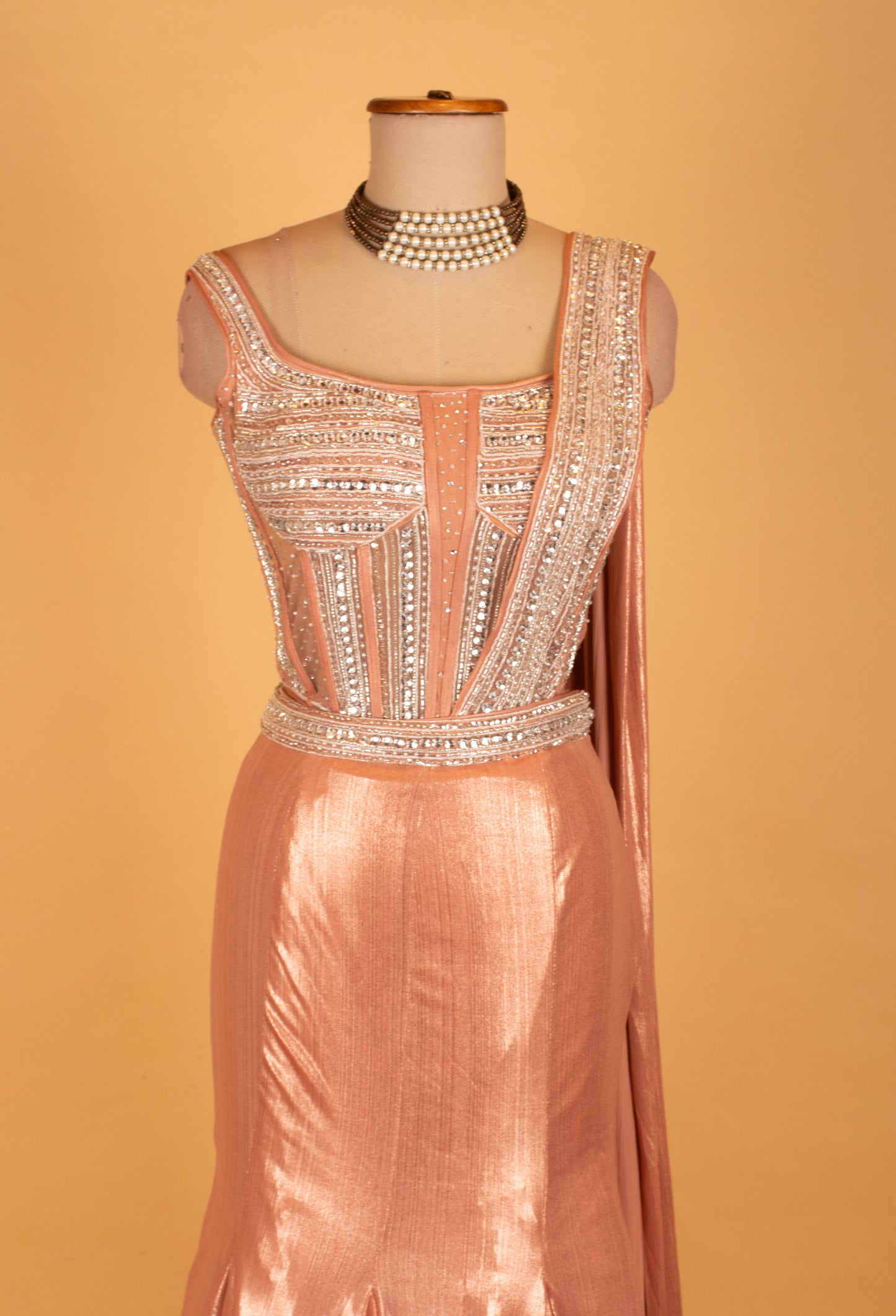 Rose Gold Metallic Mermaid Gown with Embellished Bustier & Attached Drape – Luxury Reception & Evening Wear