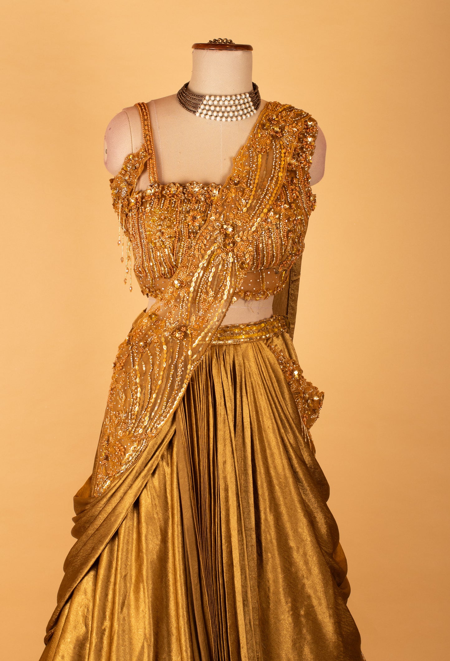 Metallic Gold Draped Lehenga with Embellished Crop Top – Designer Cocktail & Reception Wear