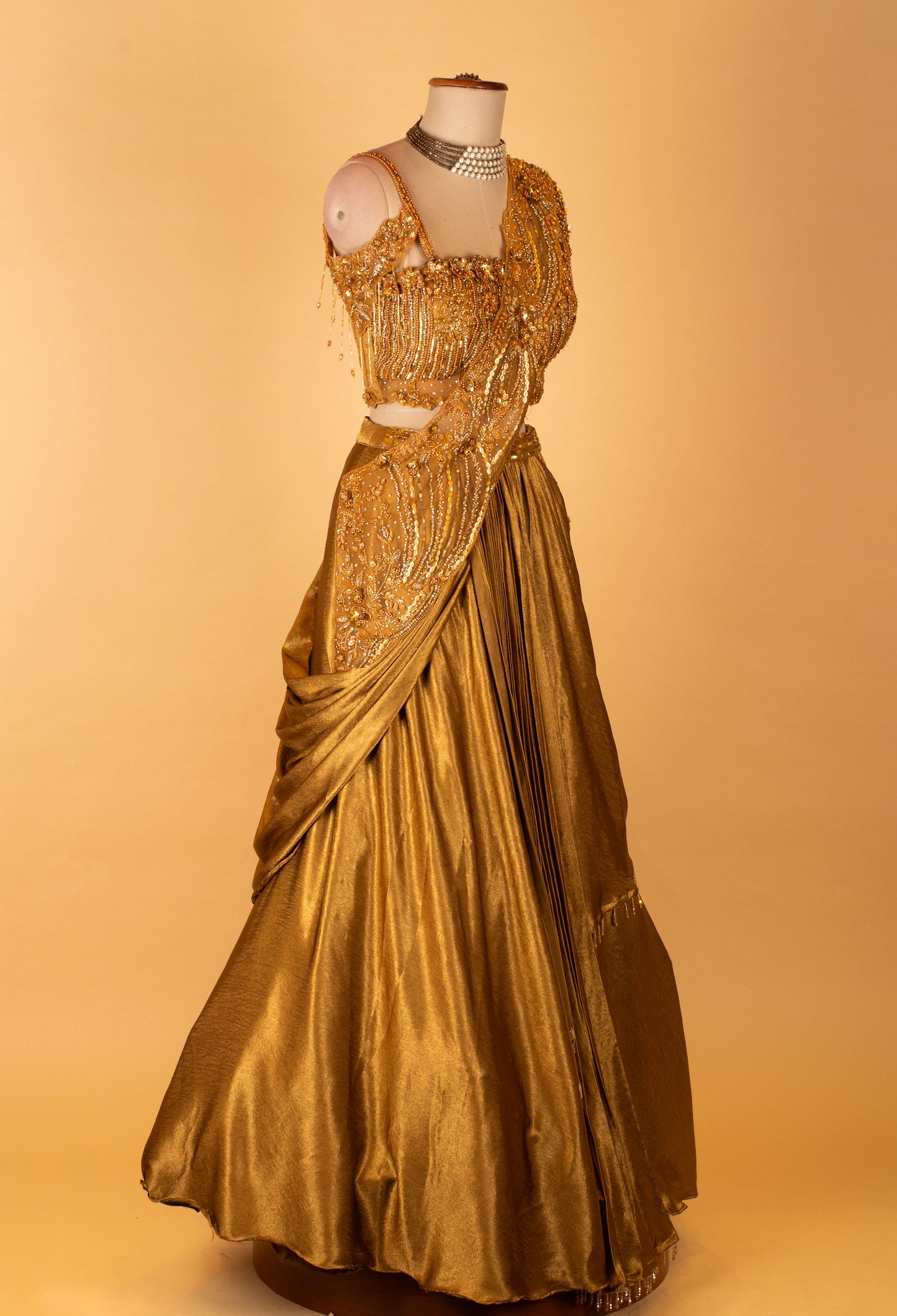Metallic Gold Draped Lehenga with Embellished Crop Top – Designer Cocktail & Reception Wear