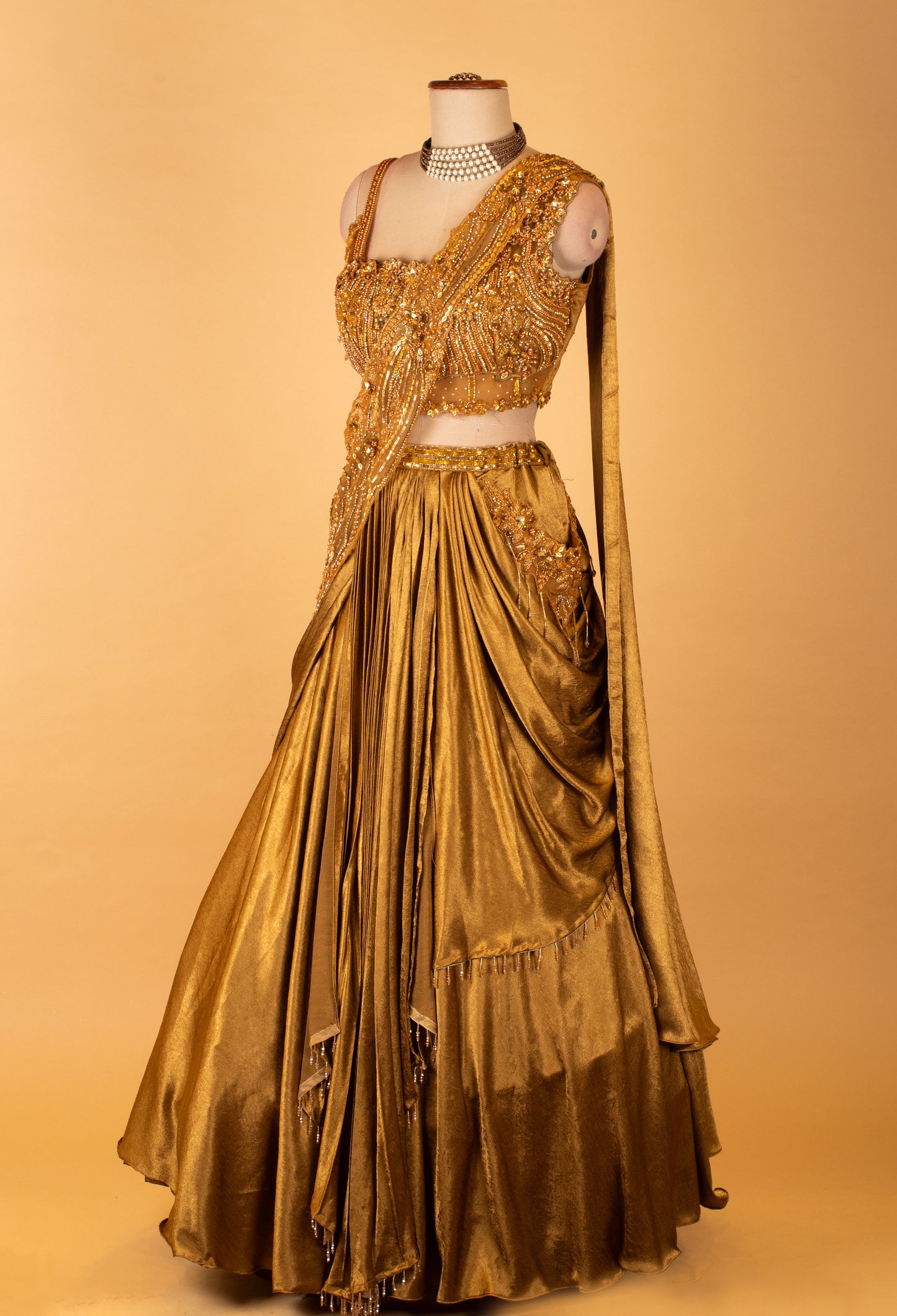 Metallic Gold Draped Lehenga with Embellished Crop Top – Designer Cocktail & Reception Wear