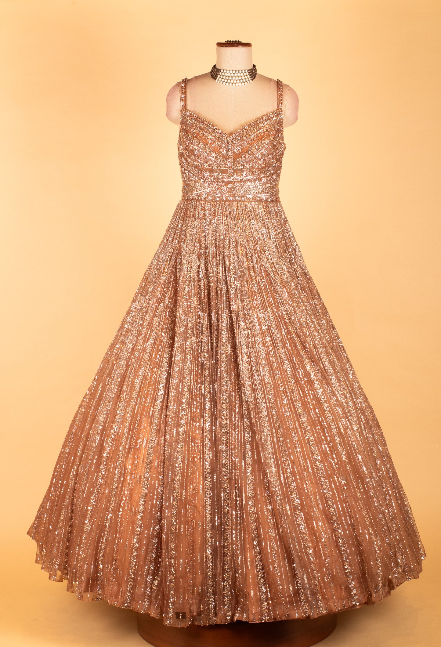 Rose Gold Fully Sequined Ball Gown with Pleated Flare – Premium Party & Reception Wear Dress