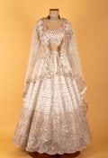 White & Gold Heavy Embellished Bridal Lehenga Choli with Cape Dupatta – Premium Wedding & Reception Wear