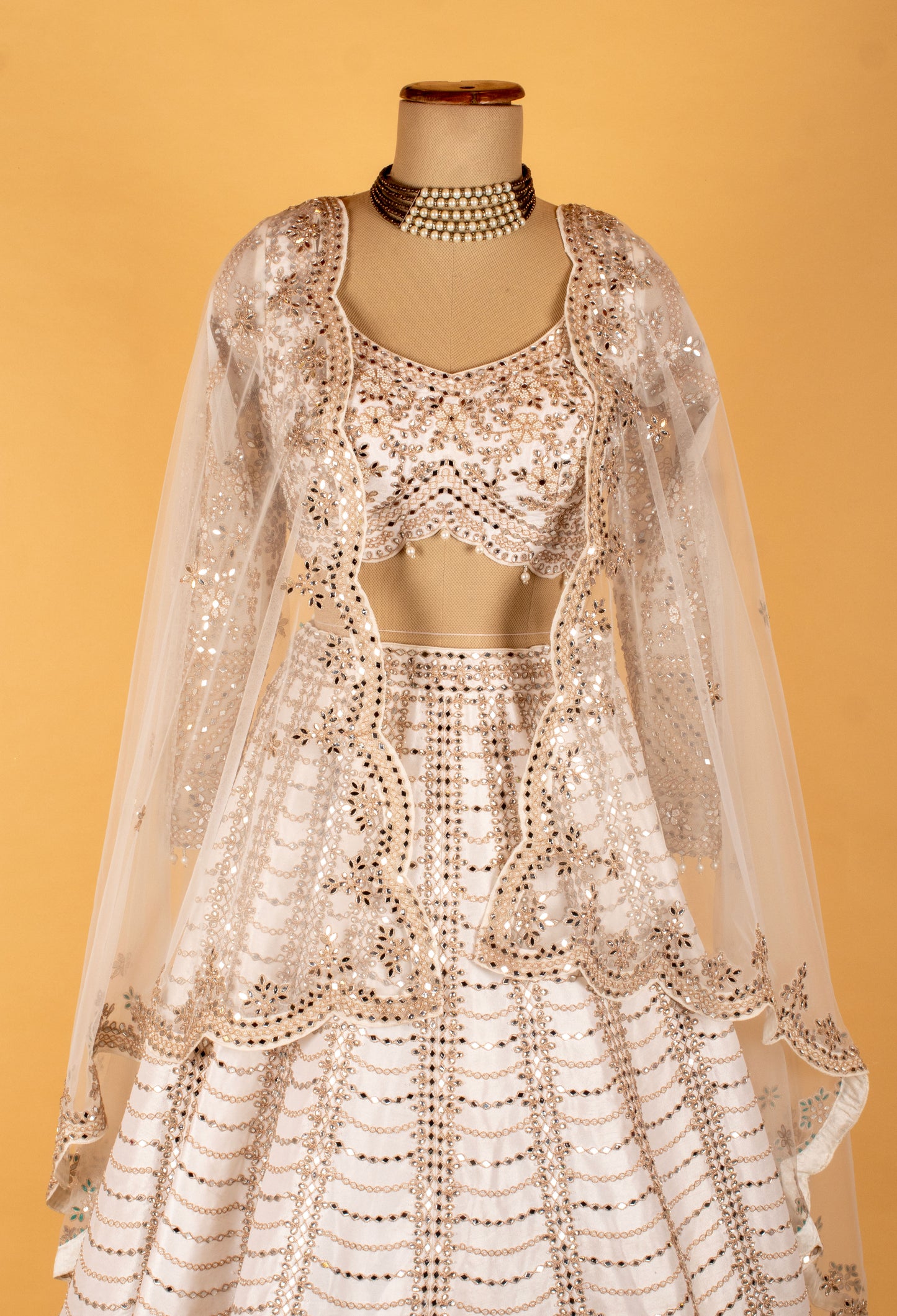 White & Gold Heavy Embellished Bridal Lehenga Choli with Cape Dupatta – Premium Wedding & Reception Wear