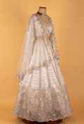White & Gold Heavy Embellished Bridal Lehenga Choli with Cape Dupatta – Premium Wedding & Reception Wear