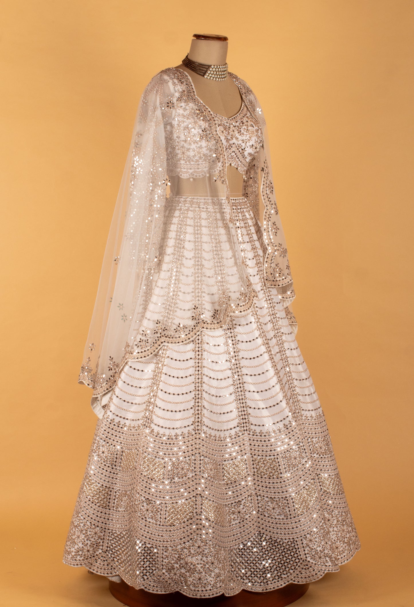 White & Gold Heavy Embellished Bridal Lehenga Choli with Cape Dupatta – Premium Wedding & Reception Wear