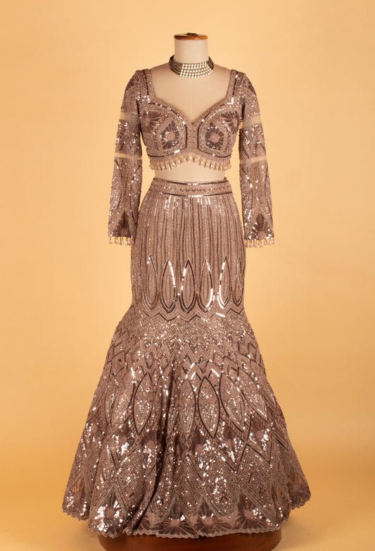 Rose gold bridal lehenga with geometric and floral sequin embroidery