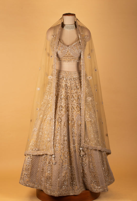 Champagne gold embroidered bridal lehenga with embellished blouse – product image 2