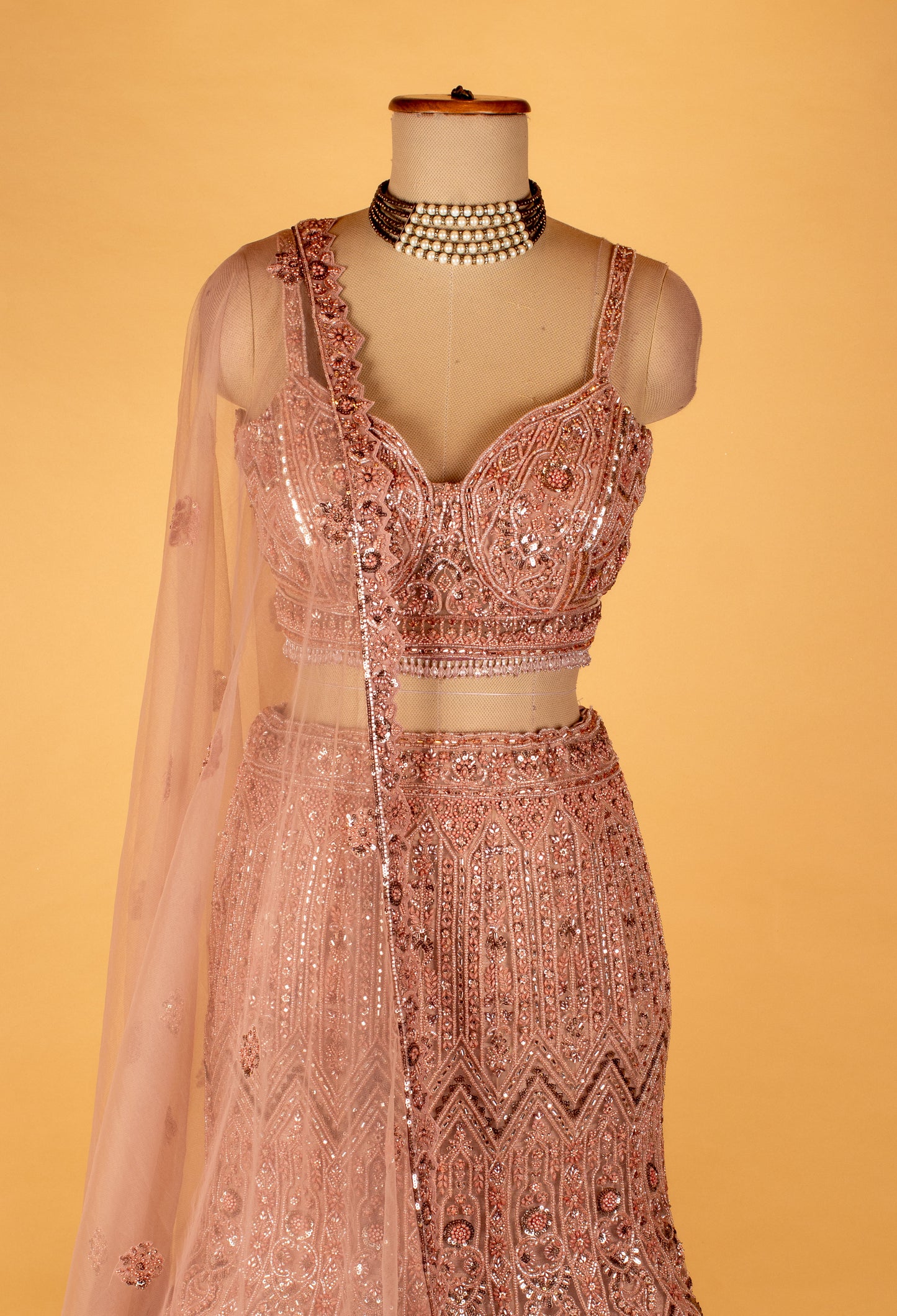 Rose Gold Embroidered Lehenga Choli with Net Dupatta