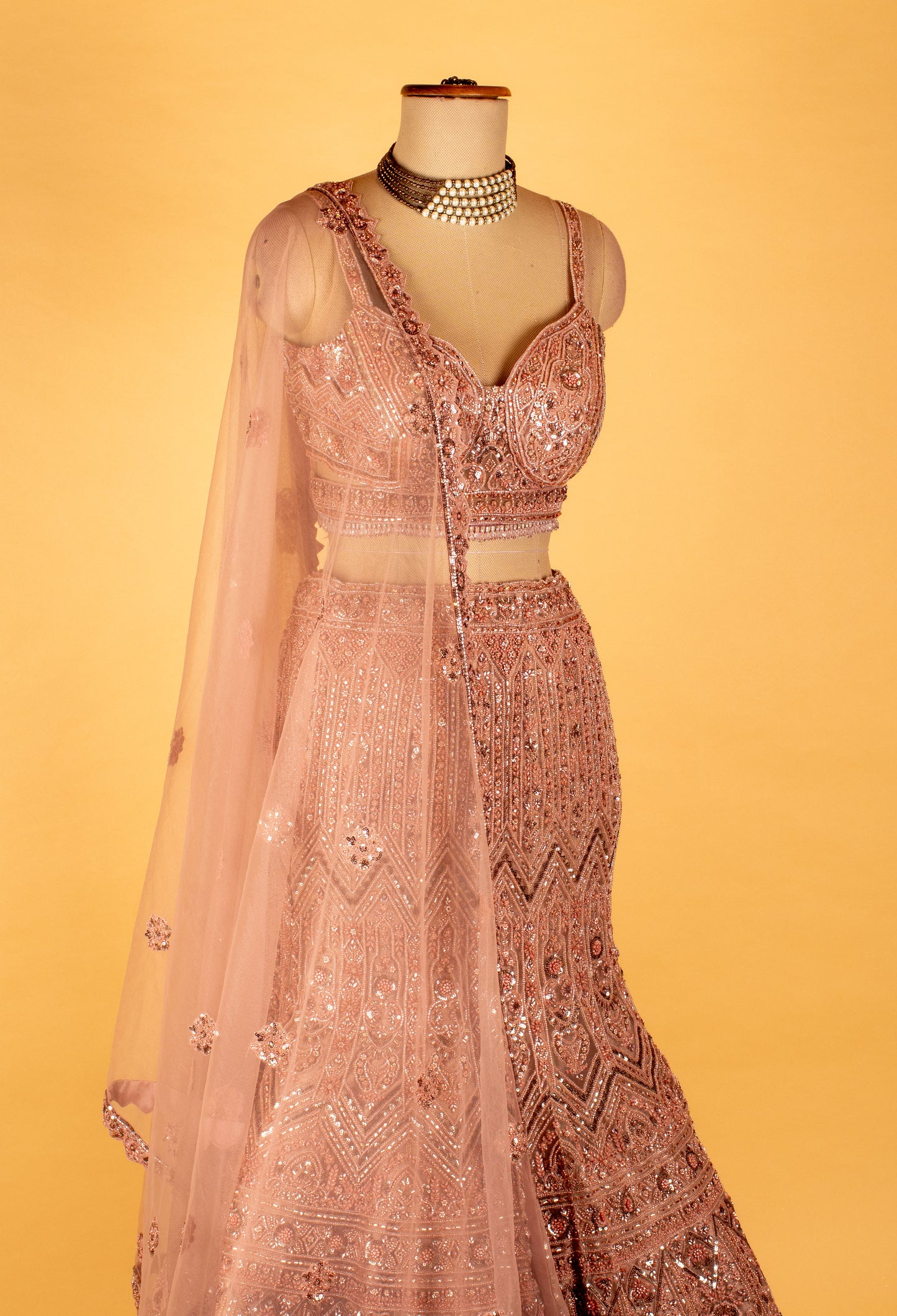 Rose Gold Embroidered Lehenga Choli with Net Dupatta