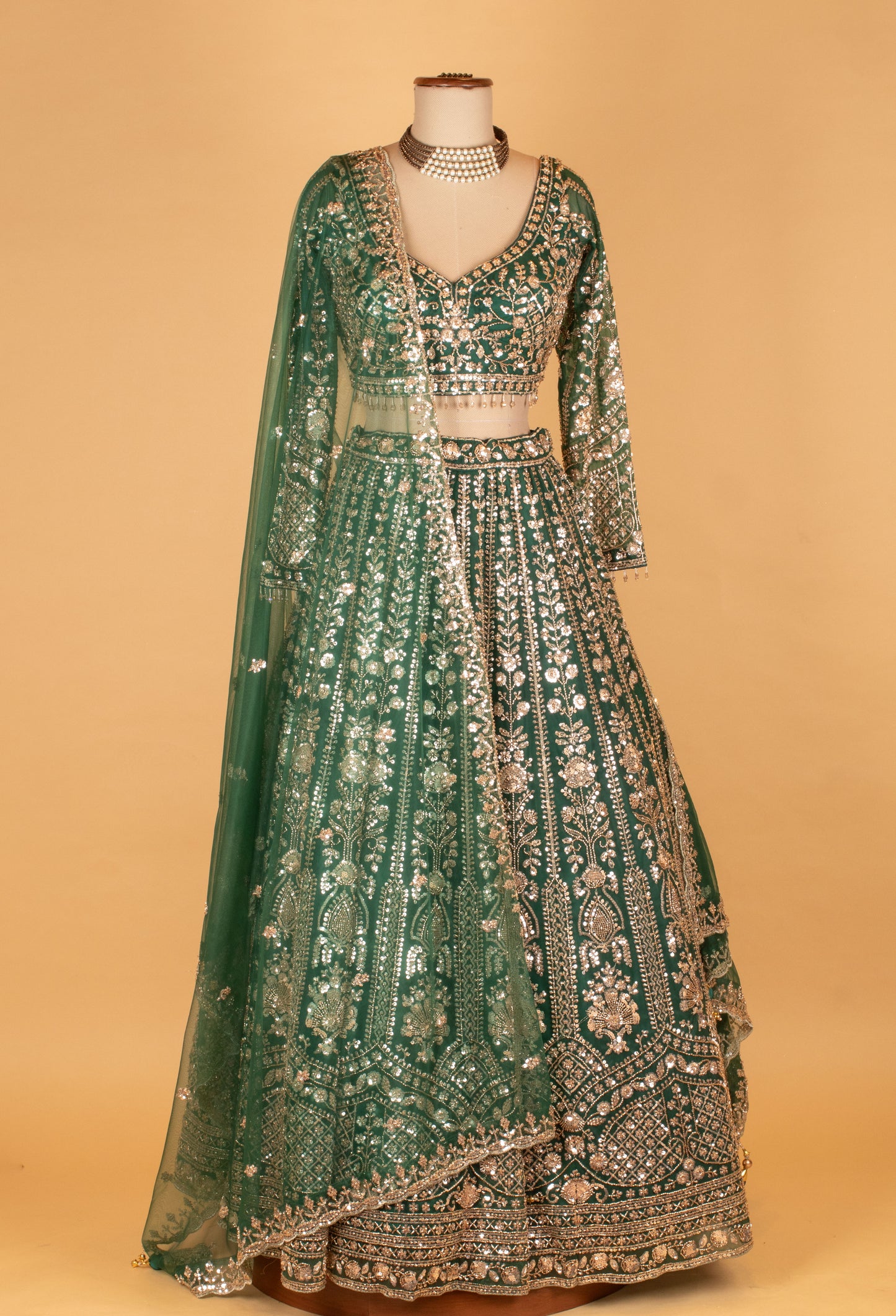 Emerald Green Heavy Embroidered Crop Top Lehenga Set with Net Dupatta