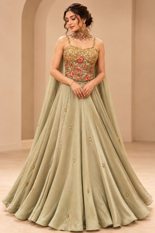 Premium Sage Green Floral Embroidered Gown with Gold Embellishments and Flowing Cape – product image 1